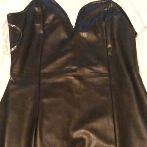 Cute lil black leather like material